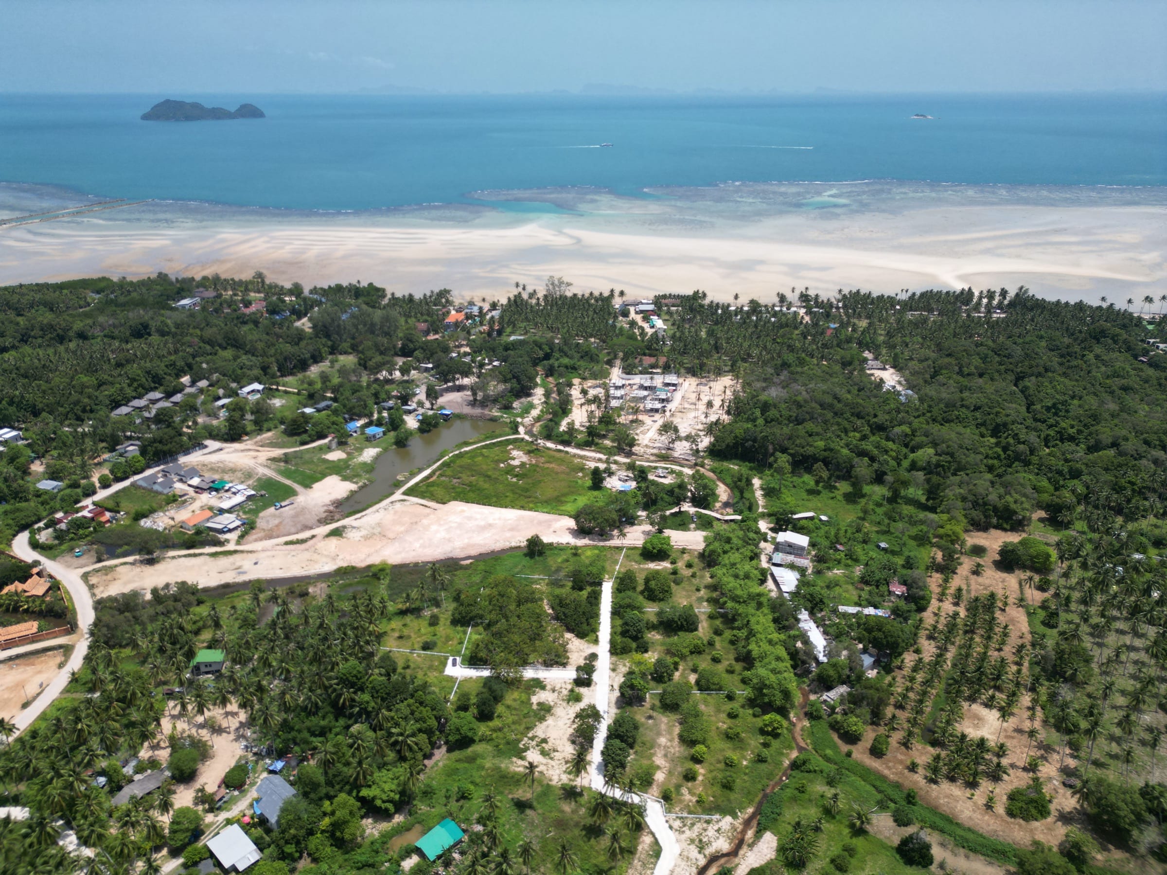 Aerial photograph of the Hin Kong coastline, with the TerraVida site inland