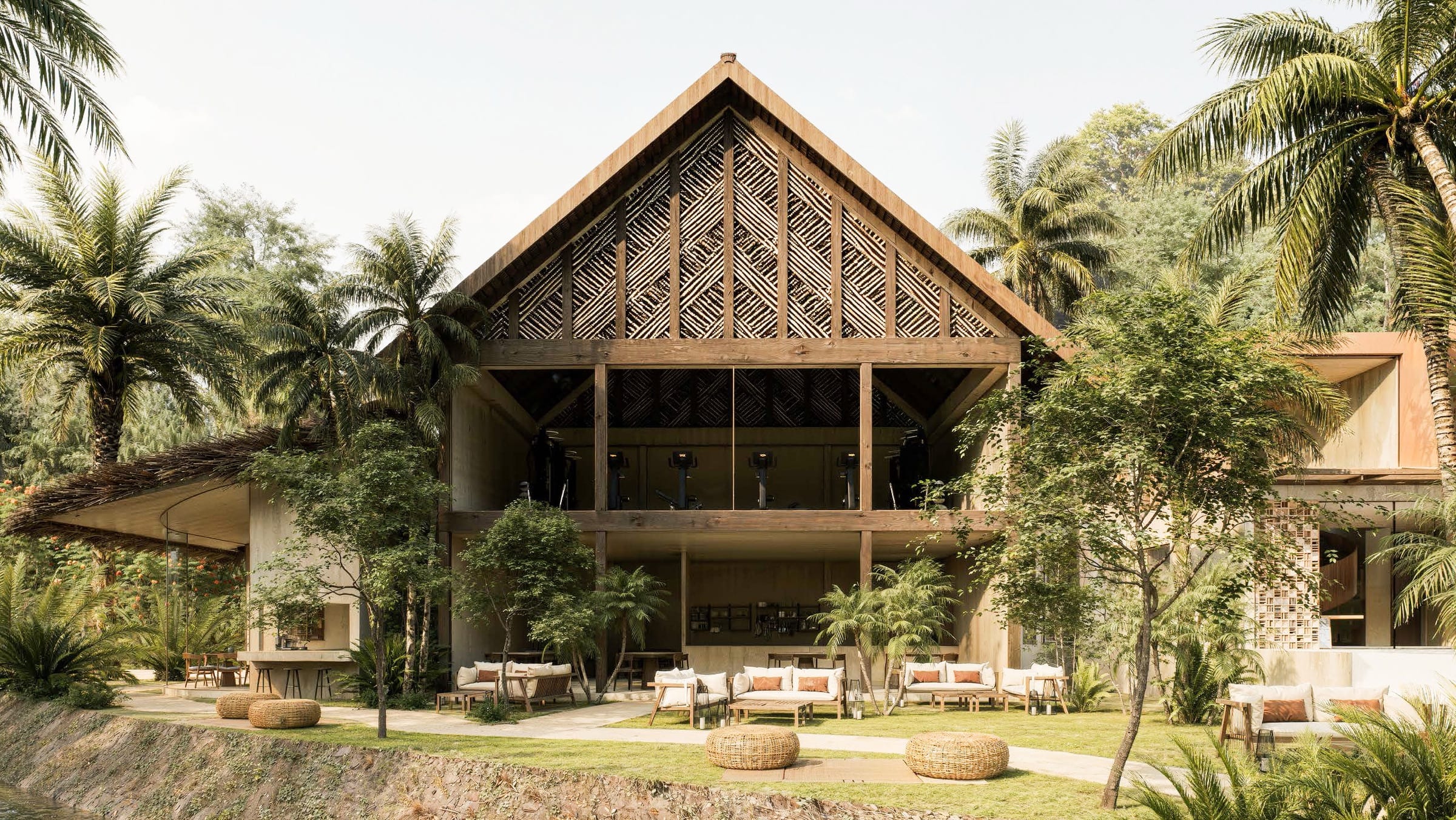 The wellness hub — restaurant, gym and workshop spaces under one pitched roof